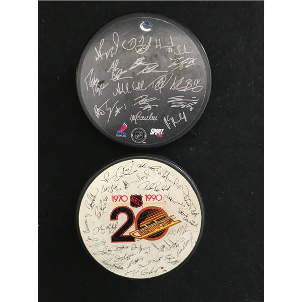 2 VINTAGE VANCOUVER CANUCKS TEAM COLLECTOR PUCKS