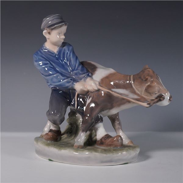 Royal Copenhagen Porcelain Figurine, Boy with Calf 772