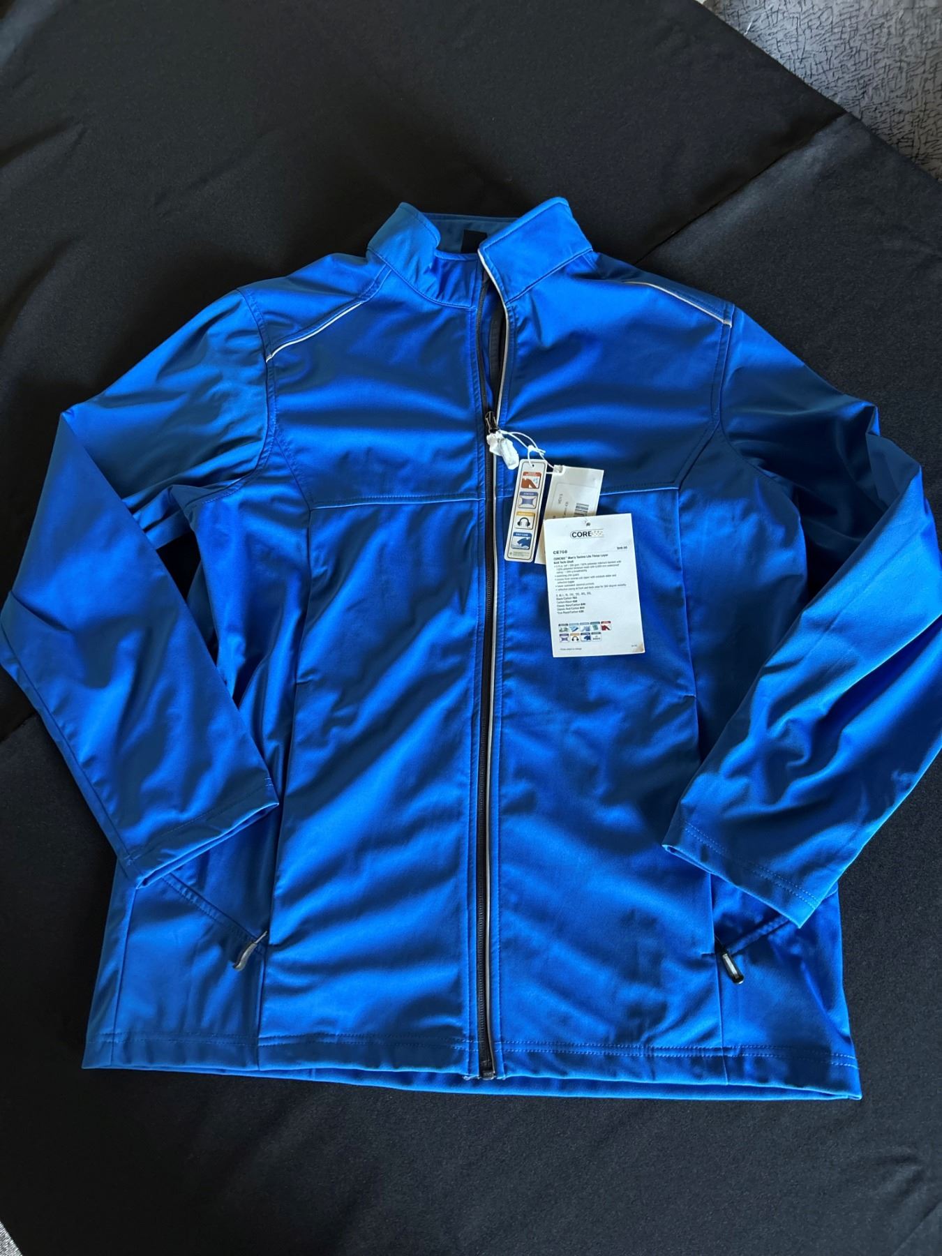 Tech Shell Jacket The CORE365 CE708 Men’s Techno Lite Three-Layer Knit Tech-Shell Jacket