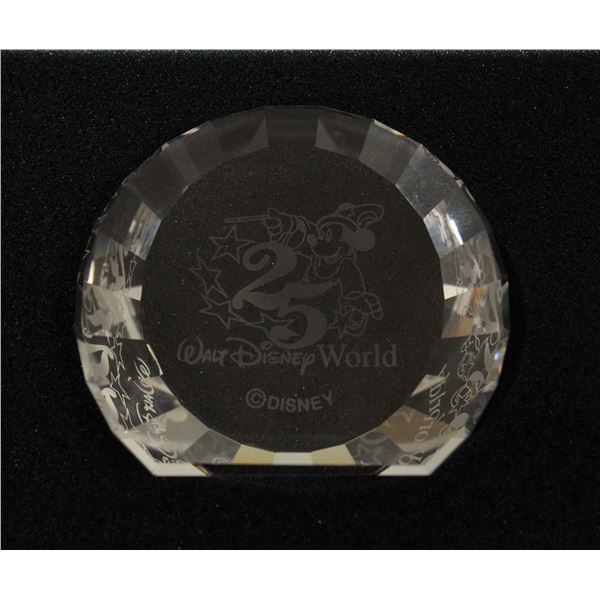 A Walt Disney World 25 Years Celebration faceted Swarovski Crystal Paperweight by Disney Showcase.