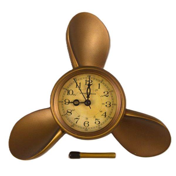 A Disney Cruiseline Howard Miller Propeller Alarm Clock.