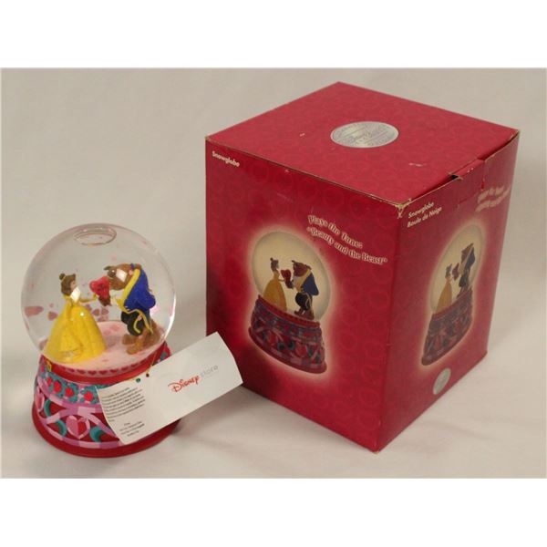 A Beauty and the Beast Snow Globe.