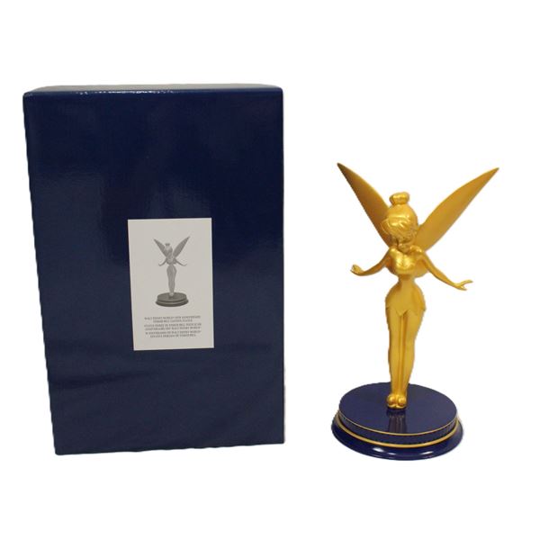 A Walt Disney World 50th Anniversary Tinker Bell Golden Statue.