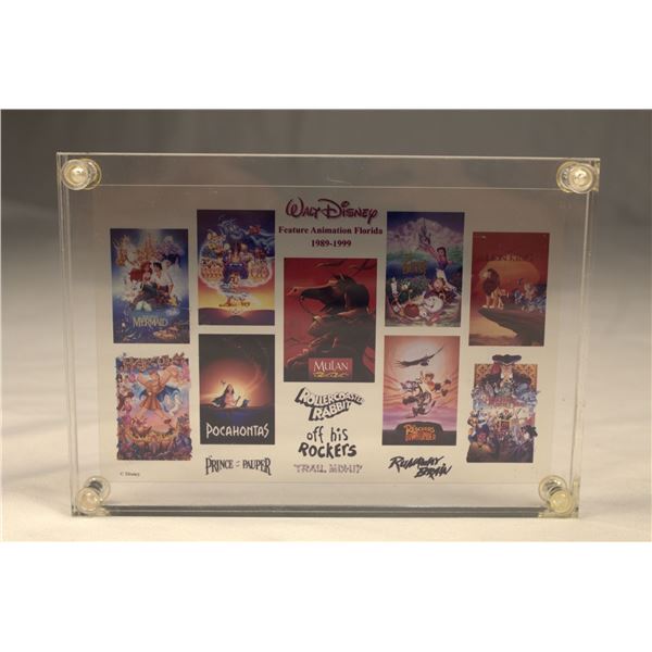 A Walt Disney Feature Animation Florida Cell paperweight.