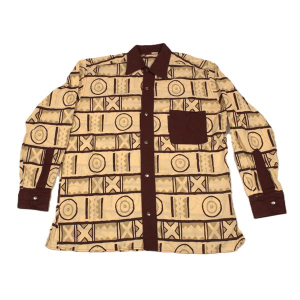 An Animal Kingdom Cast Member shirt.