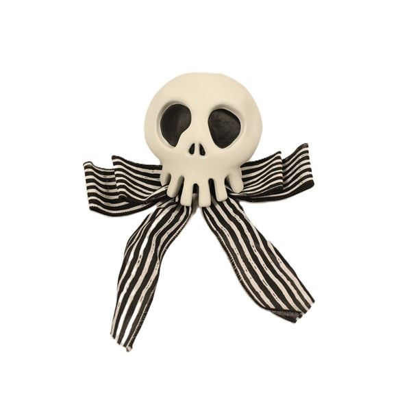 A Haunted Mansion Holiday Skull Decoration Prop Replica.