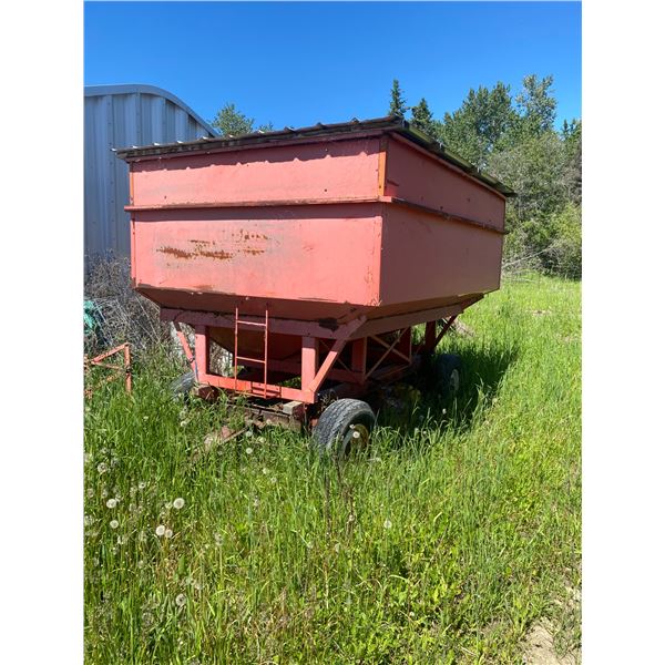 Red self-unloading grain tank c/w metal frame wagon'