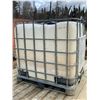 Image 1 : Plastic tote tank c/w metal cage
