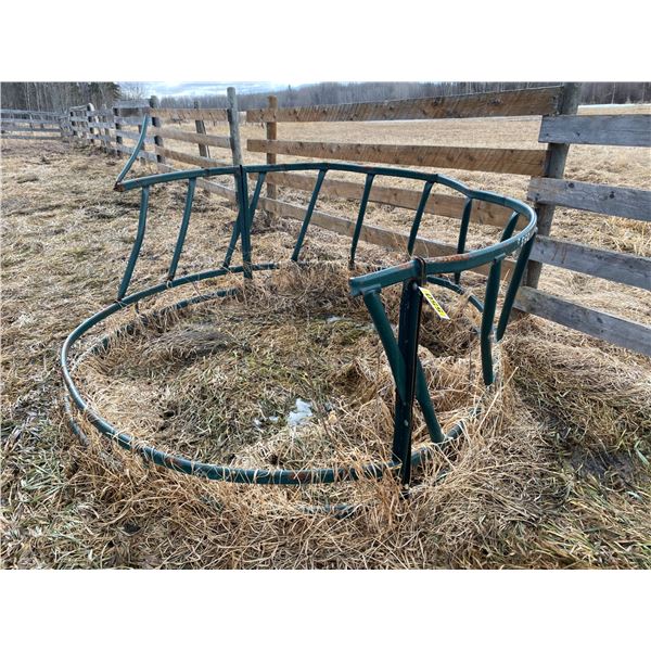 Green round bale feeder, needs repair