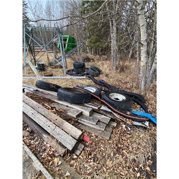 Metal cage, 2- axles, metal grating, fuel tank stand, tires, rims and lumber