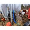 Image 1 : Pile of misc. pipe, mesh, wheel barrow, propane tanks etc.