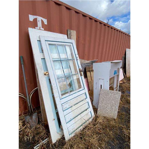 Plywood, insulation, doors, counters (south side of seacan)