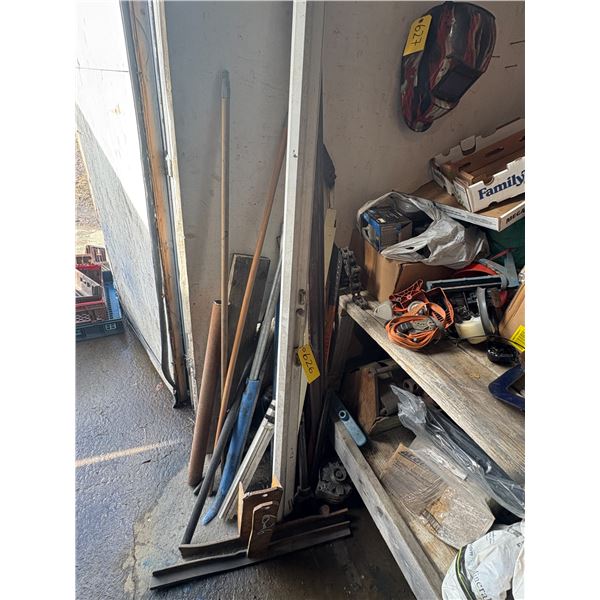 Misc. in corner- Pipe, braces, brackets, chain c/w misc. on counter