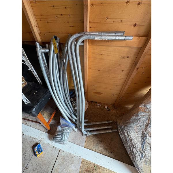 Trampoline frame goes with the rest of it which is located to the East of the building