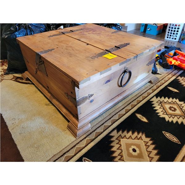 Large wooden storage box c/w rug