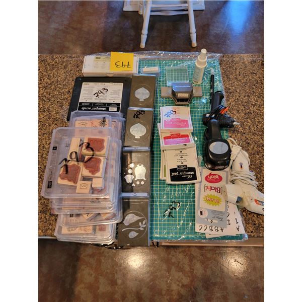 Qty of scrapbooking supplies- Stamps, ink pads, self healing sewing mat, craft punches, glue guns et