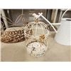 Image 2 : 435 -- CAST IRON BIRD BATH, WIRE DISPLAY BASKET, WATERING CAN, AND CAGE WITH BIRD ON IT