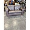Image 1 : NATUZZI BROWN LEATHER LOVESEAT
