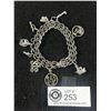 Image 1 : Vintage Sterling Silver Charm Bracelet with 9 Charms