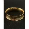 Image 1 : Beautiful 18k Gold Plated Raised Engraved Bangle