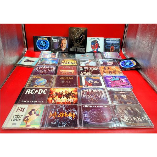 Assorted CD Lot (Metallica, Guns 'n Roses, AC/DC, Def Leppard, Nickelback, etc.)