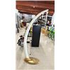 Image 1 : FAUX MAMMOTH TUSK ON STAND 75" HIGH