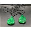 Image 1 : TWO HORSE CARVED PENDANTS OF A DYED JADE SUBSTITUTE.