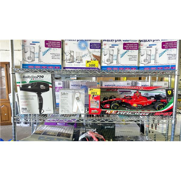 SHELF OF ASSORTED ITEMS INCLUDIN G; MAISTO TECH R/C FORMULA RACING SF-23 TOY, SILK'N TITAN ALLWAYS