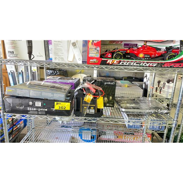 SHELF OF ASSORTED ITEMS INCLUDING; ARTIKA SOLAR BLAZE STRING LIGHTS, SALTON INDUCTION COOKTOP, CAT