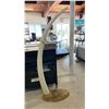 Image 1 : FAUX MAMMOTH TUSK ON STAND 75" HIGH