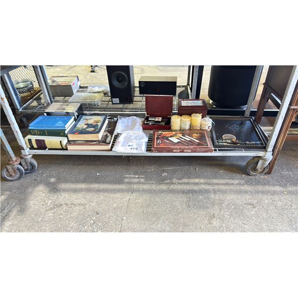 SHELF OF ASSORTED ITEMS INCLUDING; 6-PC CUTLERY SET, BOOKS, CANDLES & MORE
