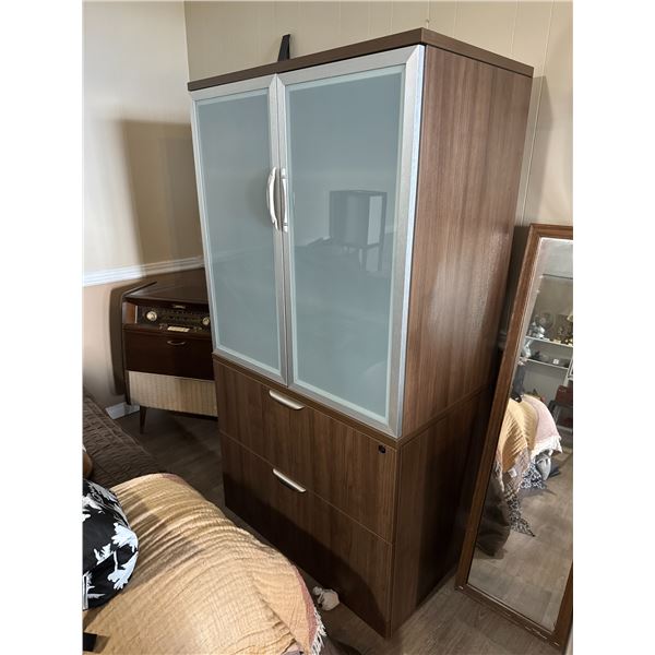 Cabinet measures 35" x 22" x 66 1/4" tall