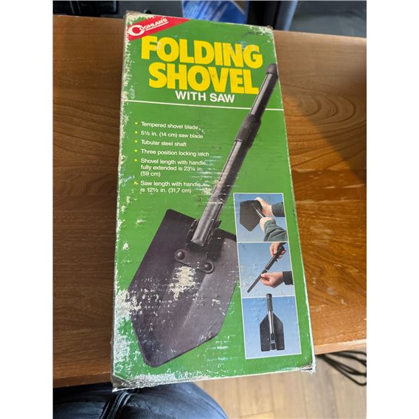 Folding shovel with saw