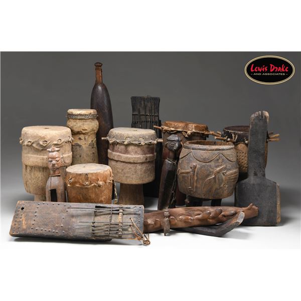 AFRICAN DRUMS AND OTHER CARVED ITEMS.