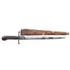 Image 1 : LARGE WHALEBONE SHEATHED EARLY DAGGER.