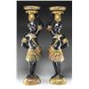 Image 1 : PAIR OF CARVED AND PAINTED NUBIAN STATUES.