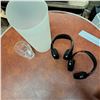 Image 1 : 2 head phones old with glass cup and plastic jug