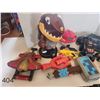 Image 2 : Lot of nerf guns, toy trucks, mini sticks and inflatable punching bag