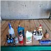 Image 1 : Gas line anti freeze, oil can, soap, starting fluid and a spray bottle