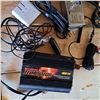 Image 2 : various different cables, 4 air tags , mobile power inverter 400W, and amplifier