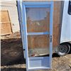 Image 1 : Storm door-79" tall by 32"wide