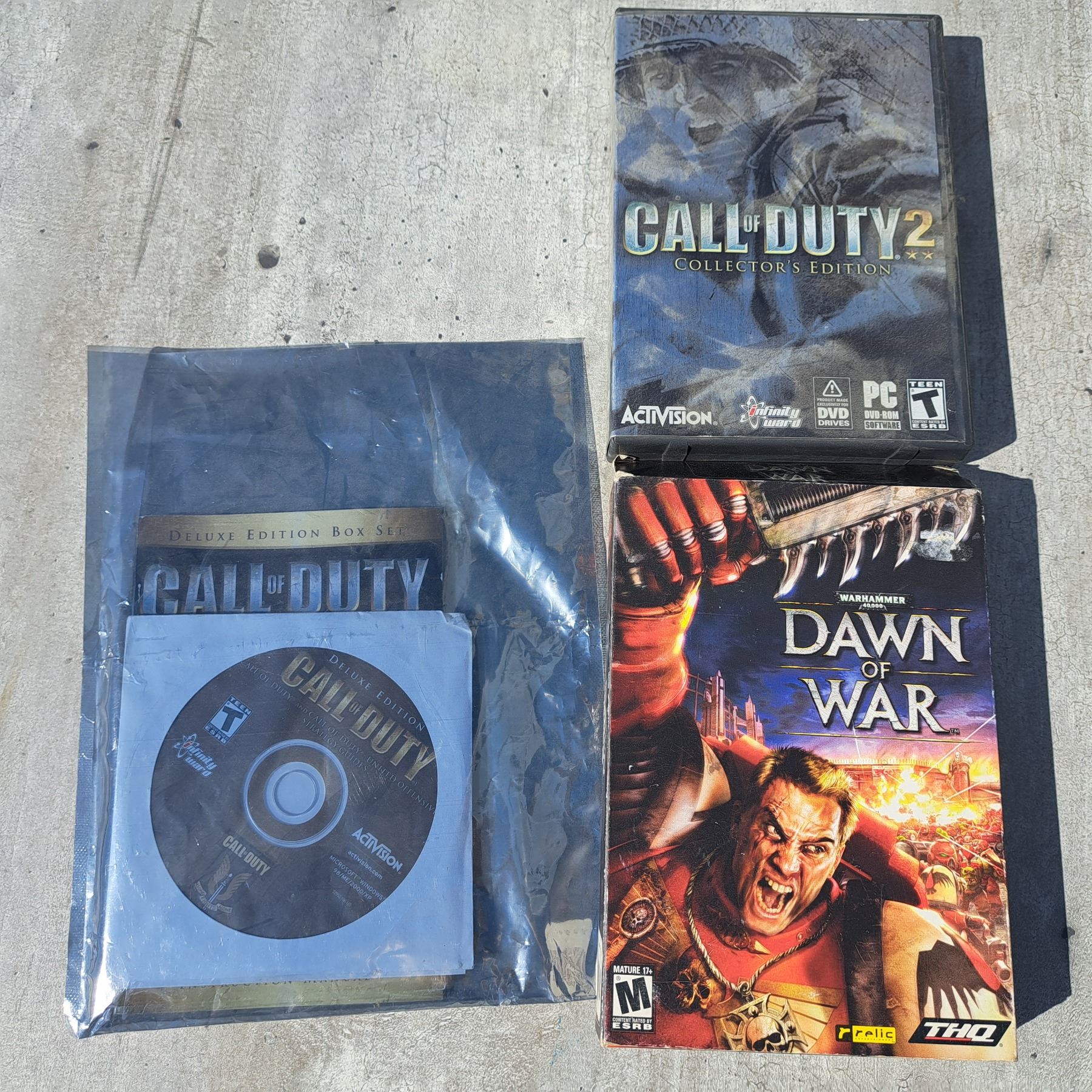 call of duty 1 and 2 collectors edition discs, and warhammer 40k game ...