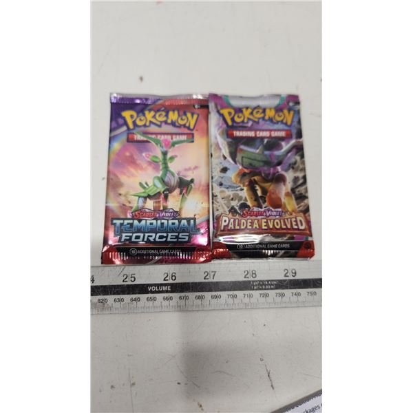 2 unopened packages of Pokemon cards