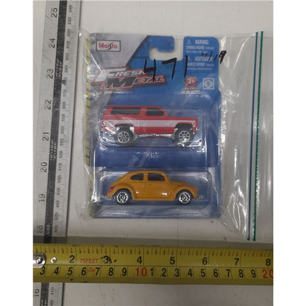 Maisto VW Bug and Blazer. Sealed