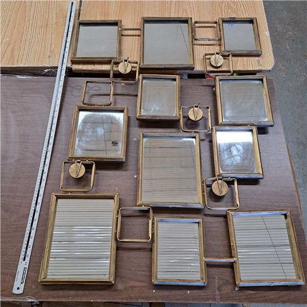 metal wallmirror with candle holders, 39.5" by 28"