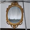 Image 1 : mirror with plastic shell and gold look finish