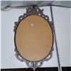 Image 2 : mirror with plastic shell and gold look finish