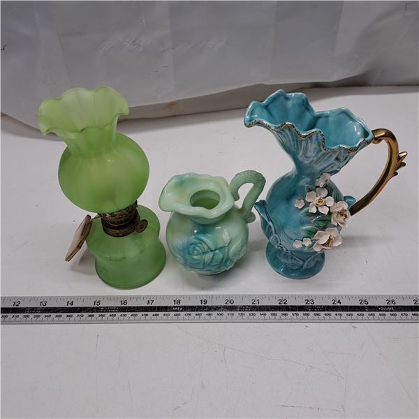 2 mini pitchers and vase with a wick