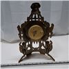 Image 2 : metal clock, the clock is loose
