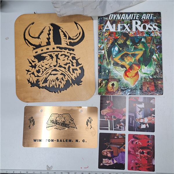 comic book artbook, taylor swift pictures, copper thunderbirds plate, and viking stencil